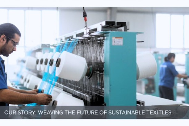 Factory worker adjusting thread cones on a weaving machine inside the Econova Textiles factory.